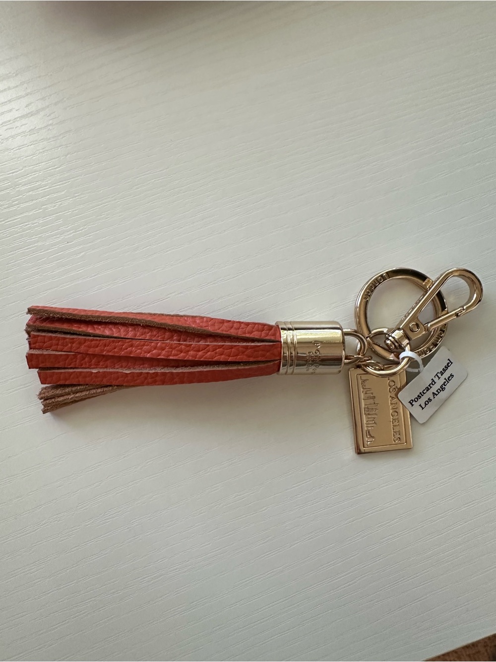 Pom Pom London Orange Leather Tassel Keychain with Gold Hardware